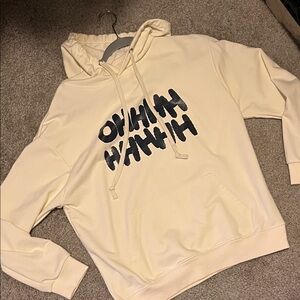 Cream Hoodie with Black Graphic